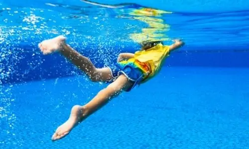 What are the benefits of swimming for children with autism?